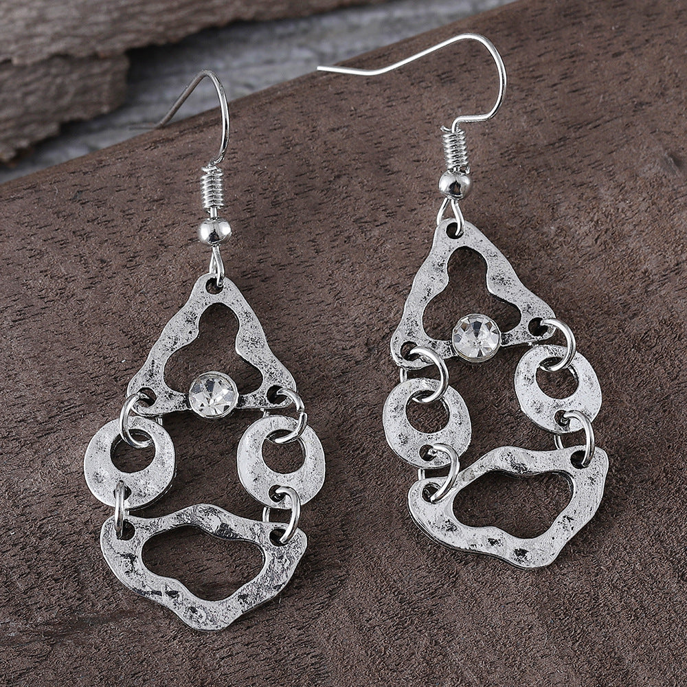 Wholesale Literary retro geometric splicing irregular hollow diamond earrings